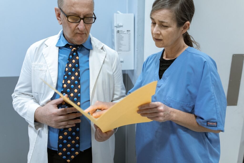 doctor reviewing patient medical history consultation